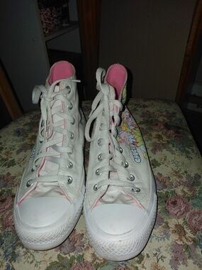 Converse White High-Top Sneakers with Pink Accents and Cartoon Side Panel